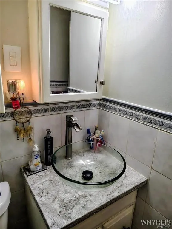 Recently-remodeled bath features stylish vessel sink