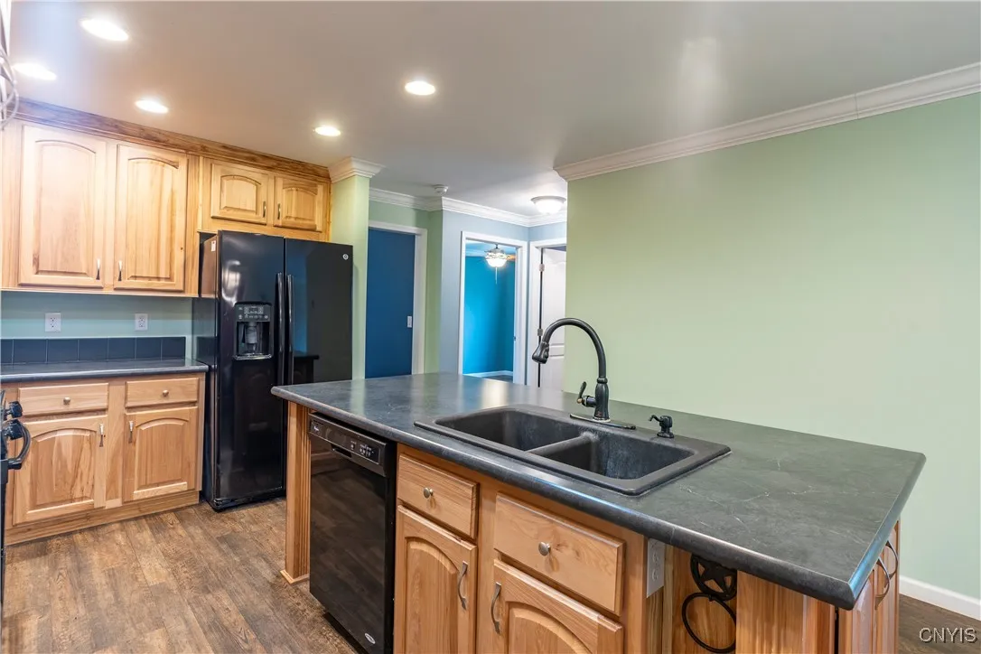 NOTICE  NUMBER OF RECESSED LIGHTS,, yOU COULD PERFORM SURGERY IN THIS KITCHEN..