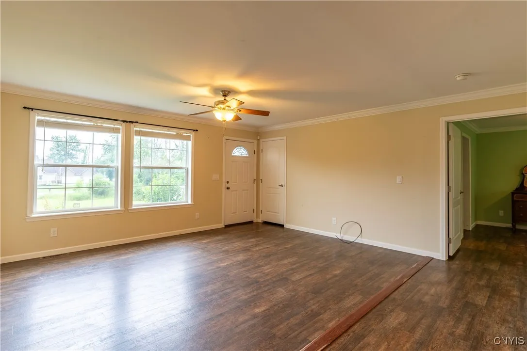 Spacious family room at the heart of the home, ideal for a big-screen setup and cozy gatherings.