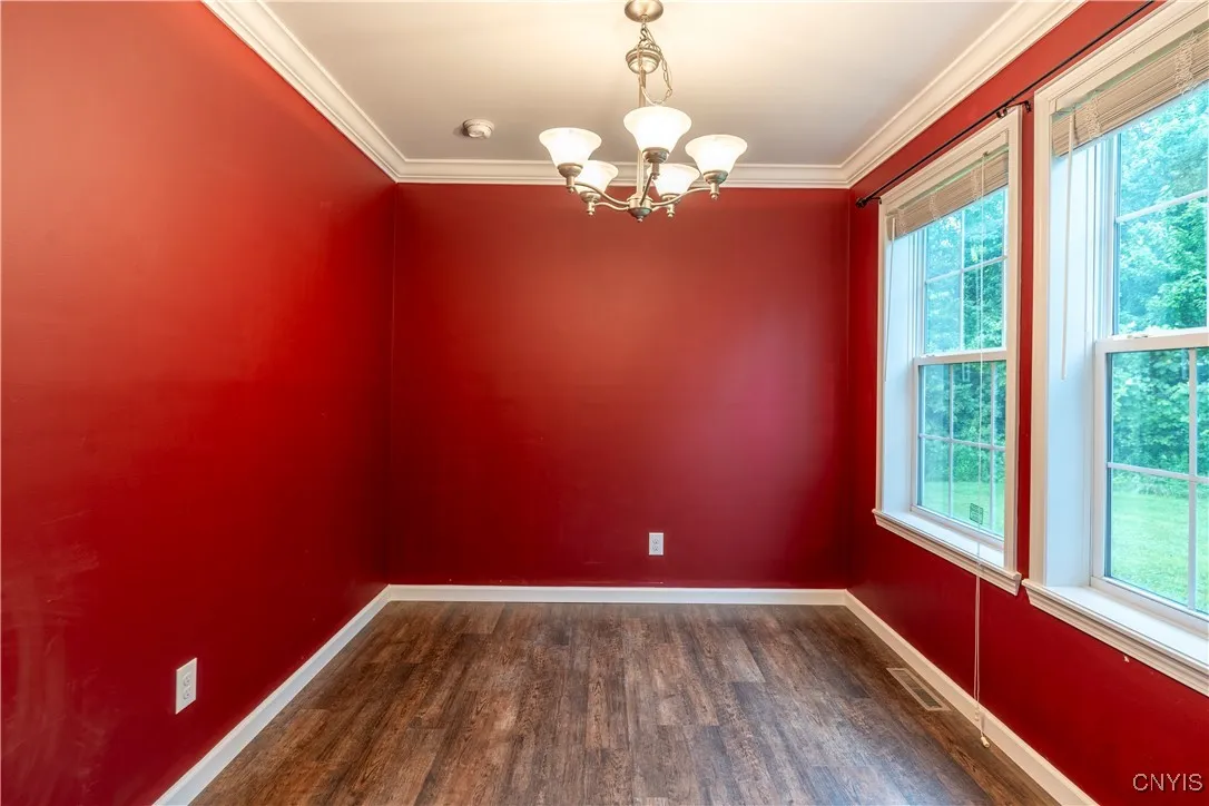 Whether you're hosting intimate dinners or seeking a quiet space to work or relax, this adaptable room delivers. Framed by two elegant doors, it offers both charm and privacy.