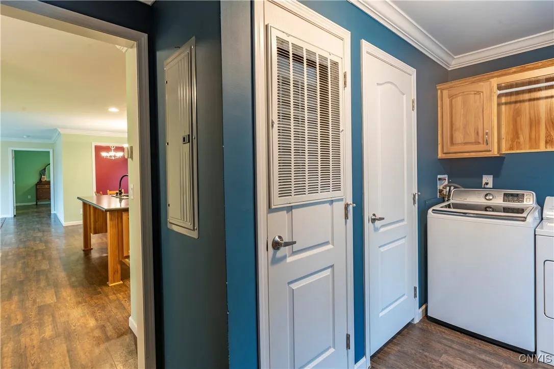 Convenient First-Floor Laundry Enjoy the ease of a generously sized first-floor laundry room, thoughtfully designed for maximum efficiency. With plenty of space for sorting, folding, and storage, laundry day becomes less of a chore and more of a breeze. Its central location adds everyday convenience without sacrificing style.