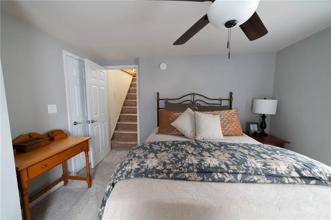 Bedroom 2 showing walk up attic stairs