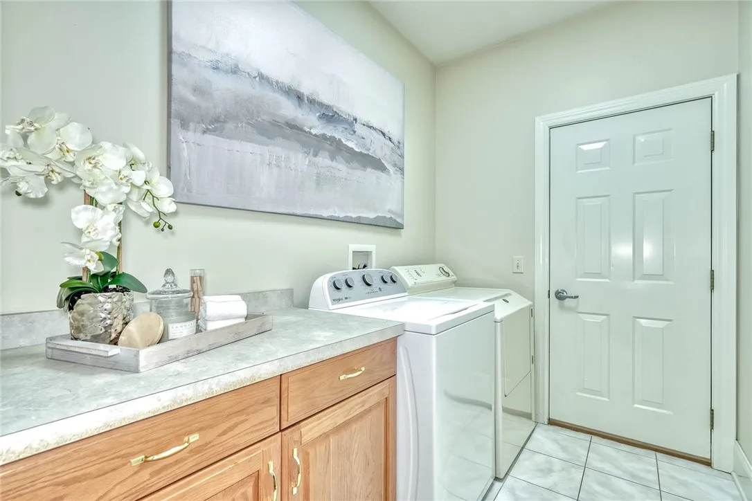 Convenient first floor laundry/mudroom with outdoor access.
