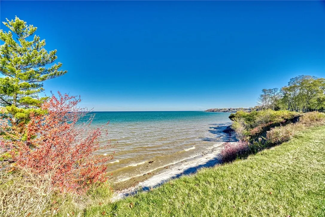 From the deck to the level backyard, the lake is always the backdrop.