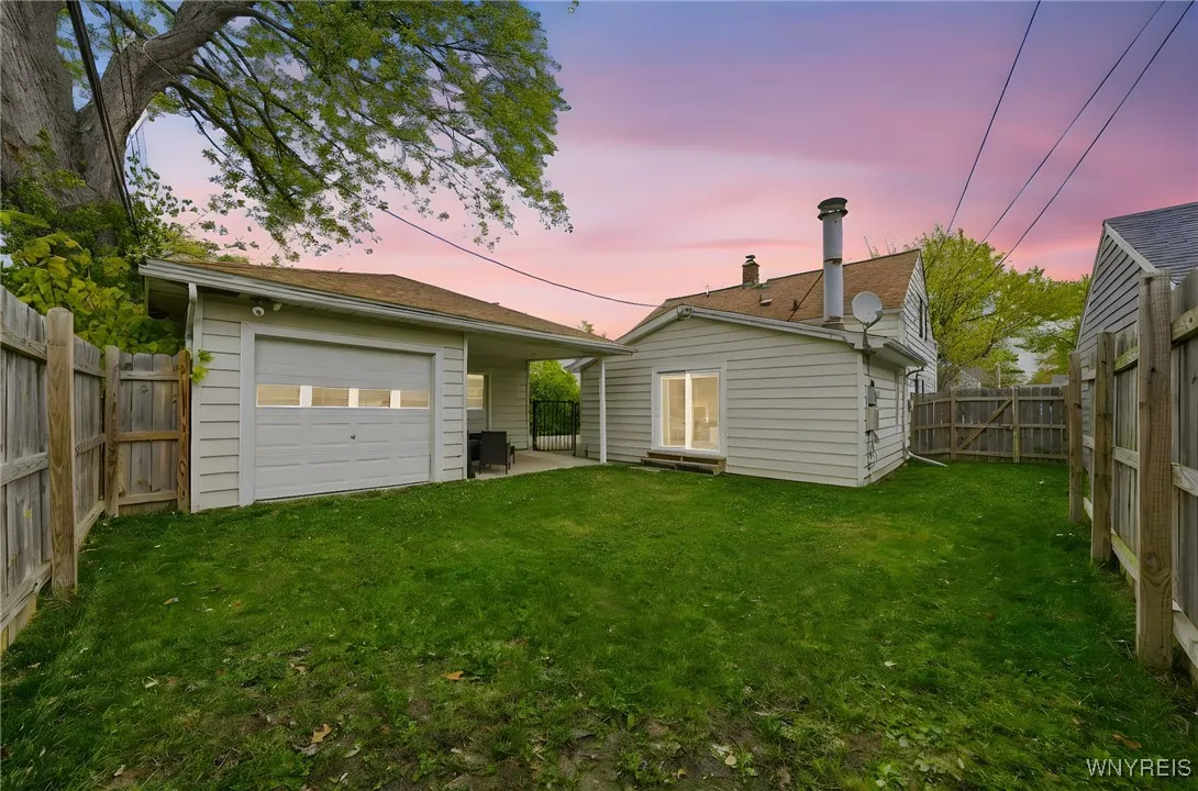 FULLY FENCED YARD AT DUSK