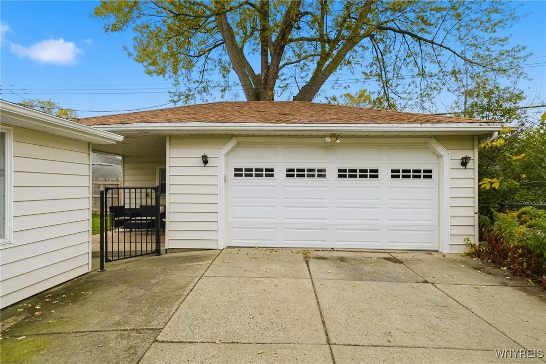 2.5 CAR GARAGE WITH ELECTRIC OPENER