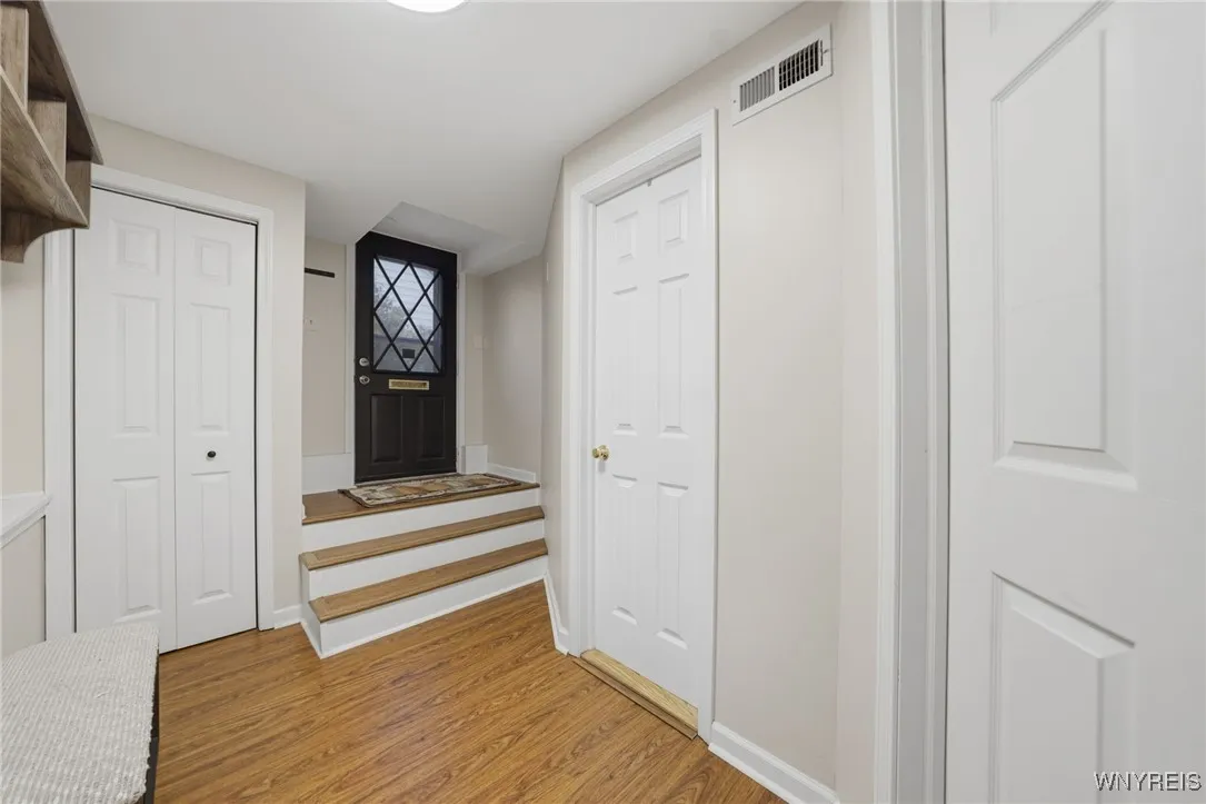 SIDE ENTRY FROM DRIVEWAY, BATHROOM & LAUNDRY ROOM ACCESS