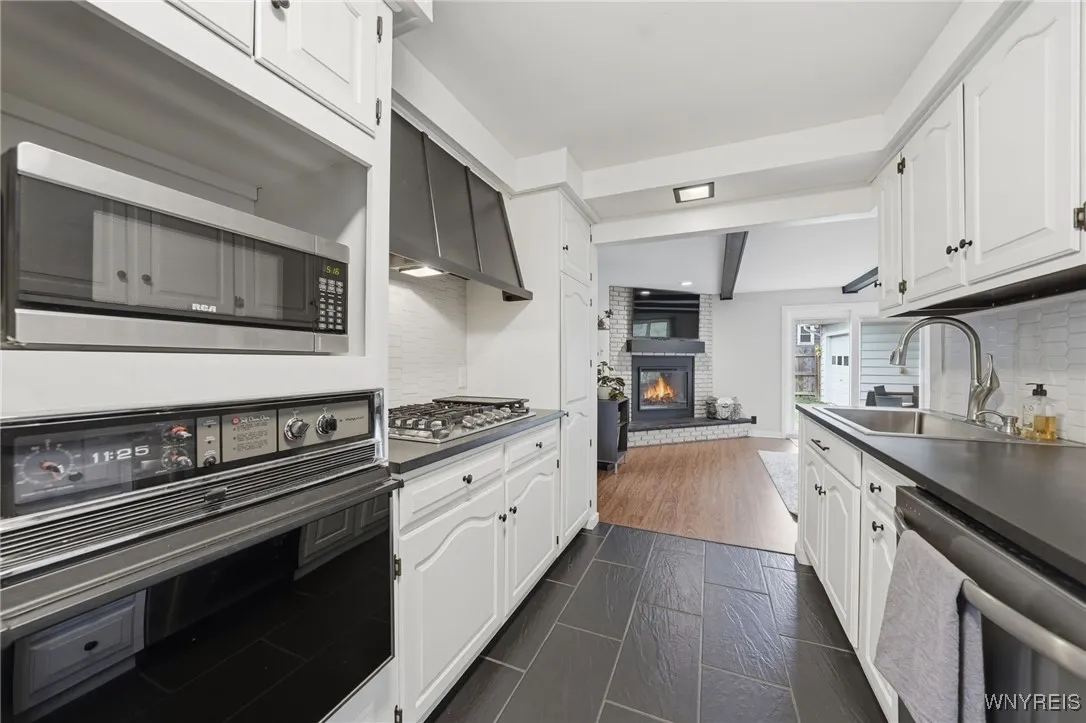 KITCHEN LOOKING INTO GREAT ROOM
