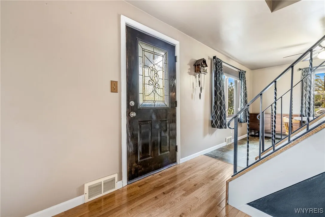 FRONT ENTRY STUNNING HARDWOOD FLOORS