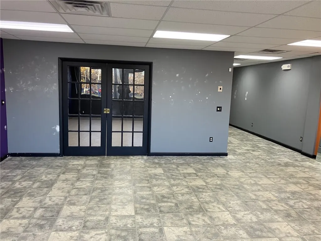 Large Office Off Of Large Open Room