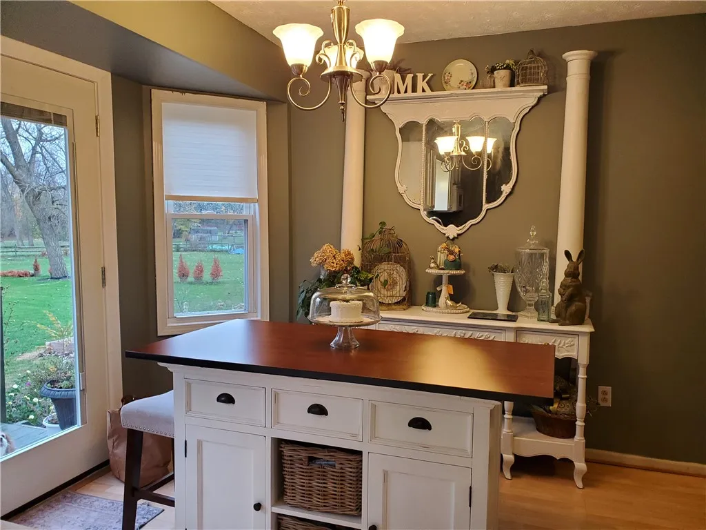 Kitchen Eat In Area With French Doors To Deck