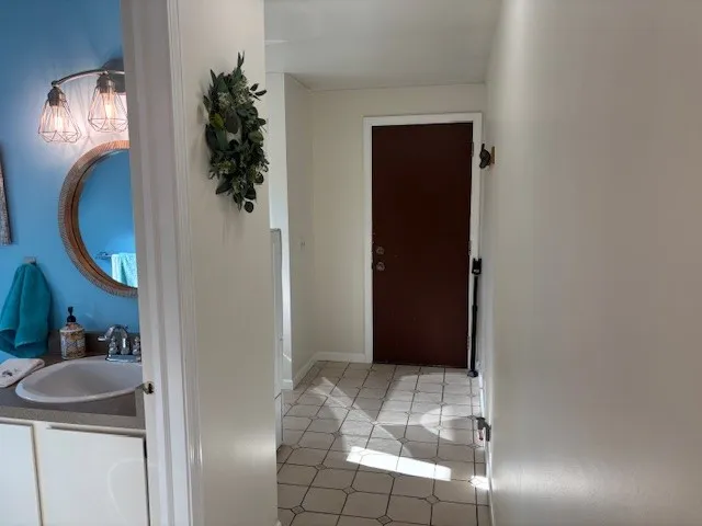 Ceramic tiled Back Hallway leading to Garage