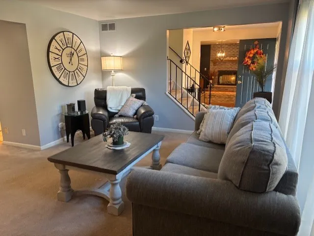 View from Living Room looking towards Front Entry into Formal Dining Room