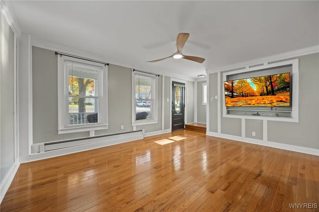 Living Room also with Beautiful Maple Hardwood Flooring