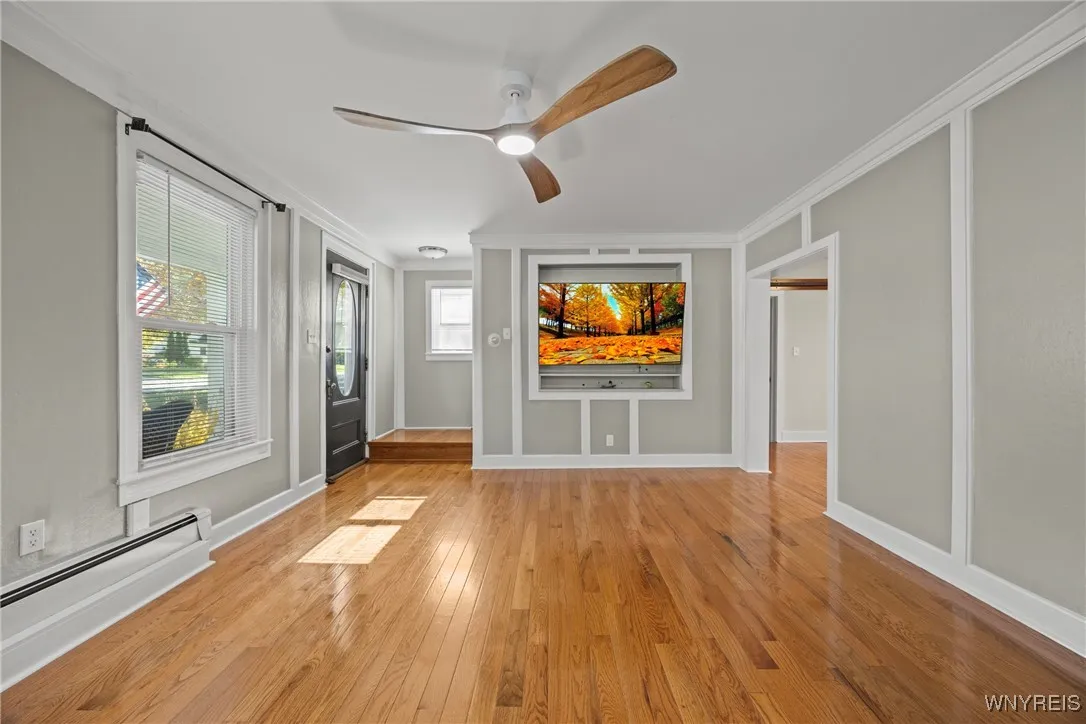 Living Room also with Beautiful Maple Hardwood Flooring