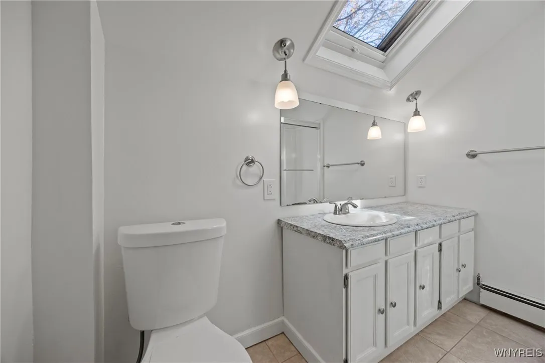 2nd floor Remodeled Full Bath with Sky Light