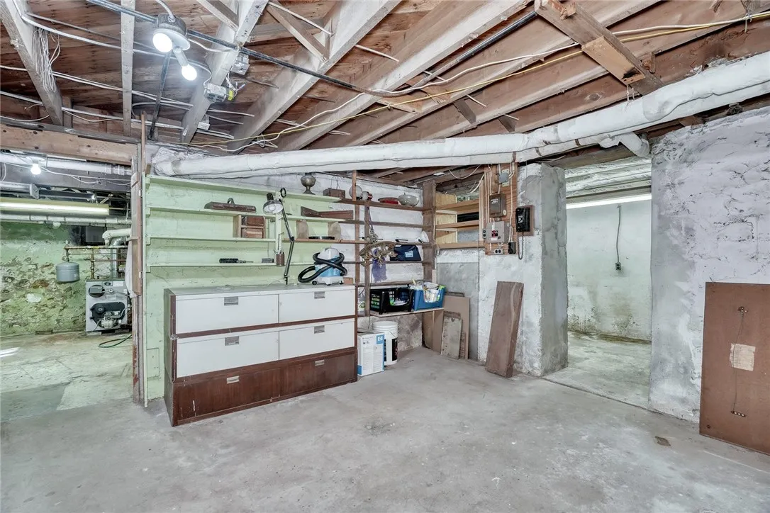 Never ending basement-Multiple rooms for storage, hobby space, and mechanicals