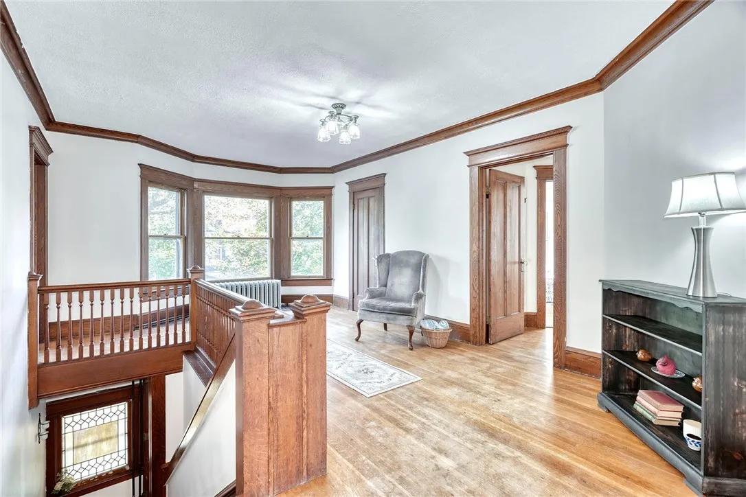 The upstairs landing feels open and full of light — wide enough for a reading chair or desk,