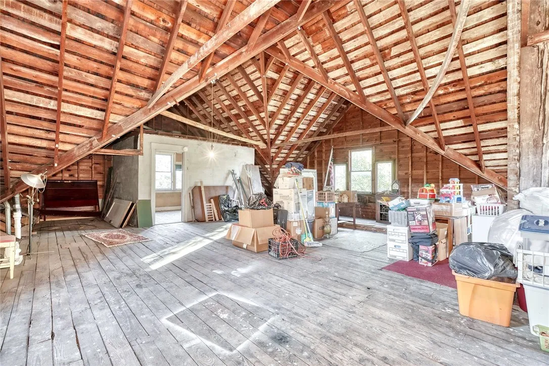 Full unfinished walk up attic with loads of potential!