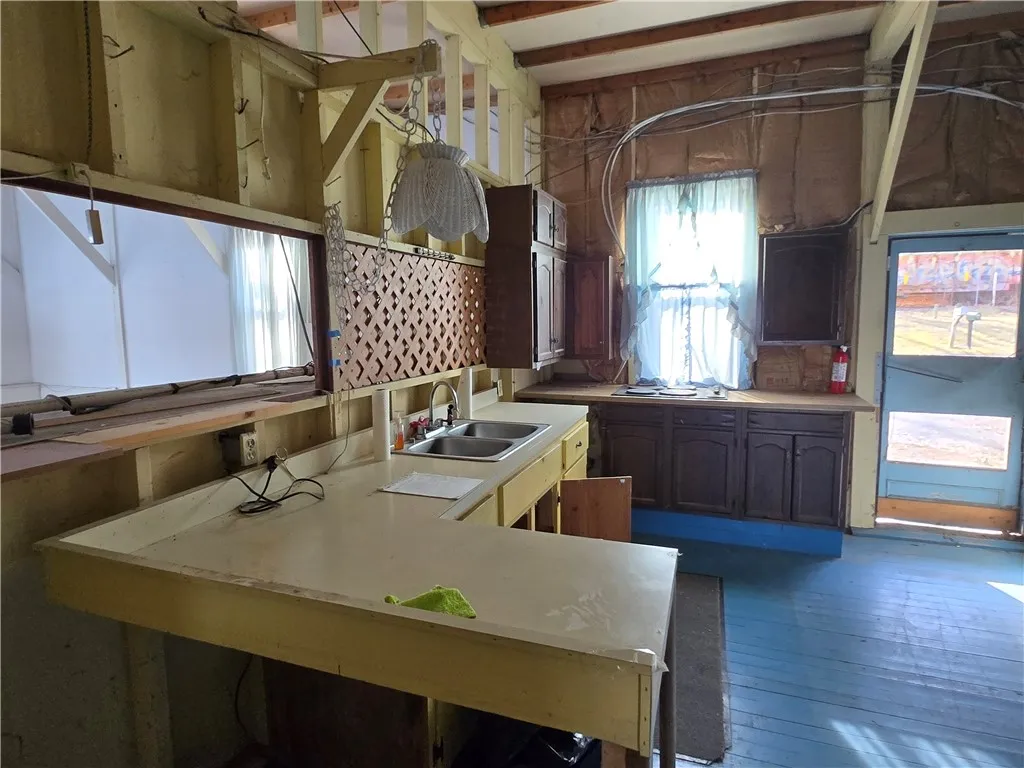 Interior has been cleared and is ready for full renovation — ideal blank slate to rebuild or reimagine.