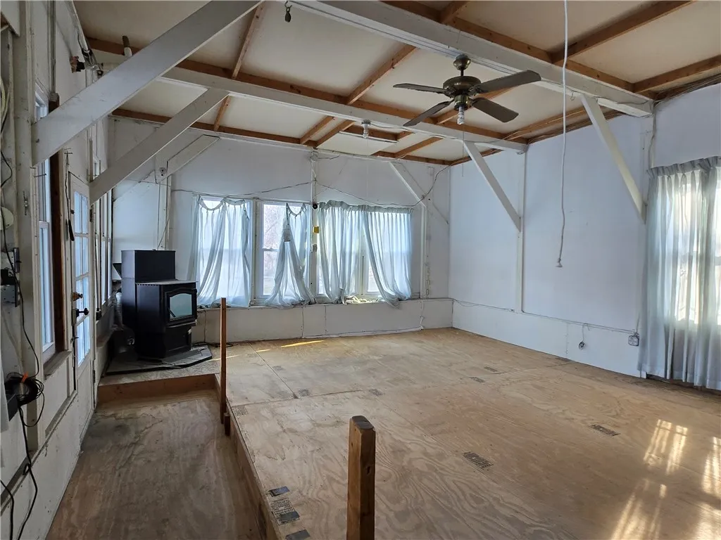 The inside has been largely stripped and is ready for a complete rehab