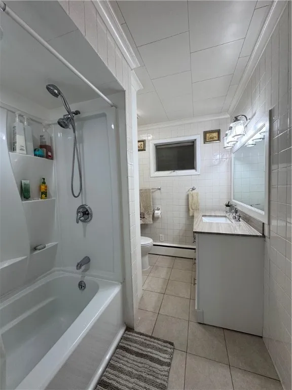 Full bathroom with ceramic flooring