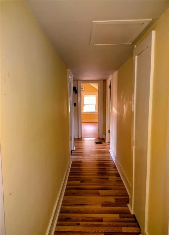 Upstairs hall leading to 3 bedrooms and full bath
