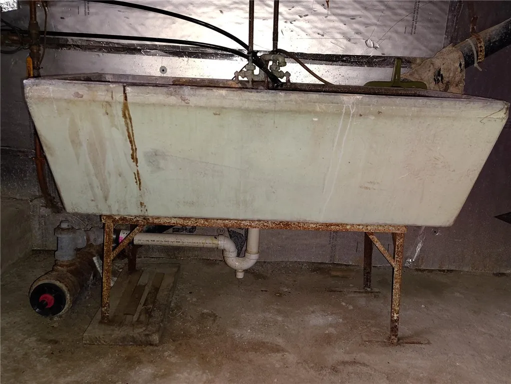 Old Concrete double utility sink