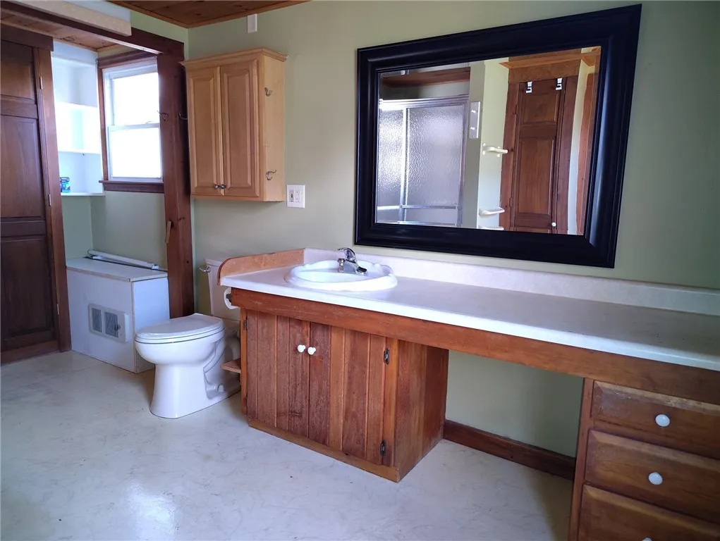 Full bath just off kitchen and main bedroom