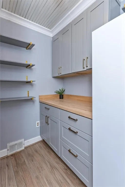 Walk-in pantry with freezer.  Freezer will stay.