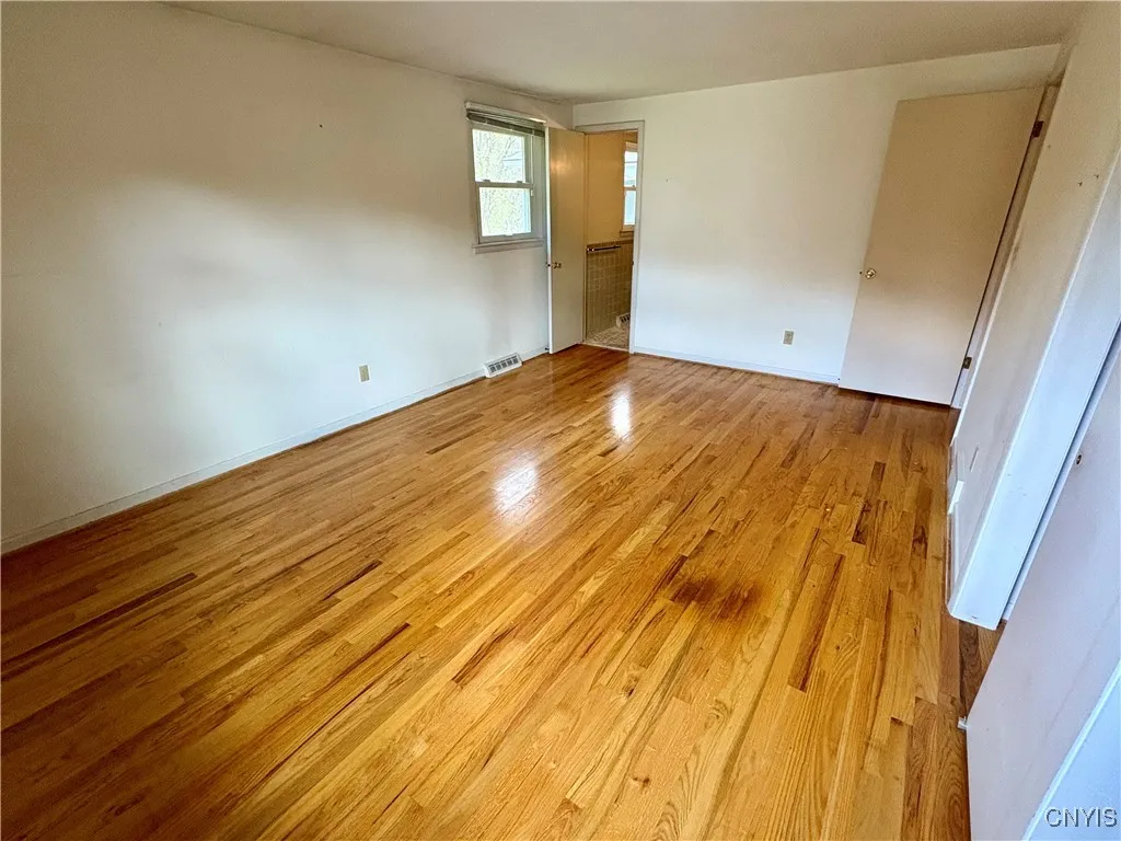 Primary bedroom with bath en suite.