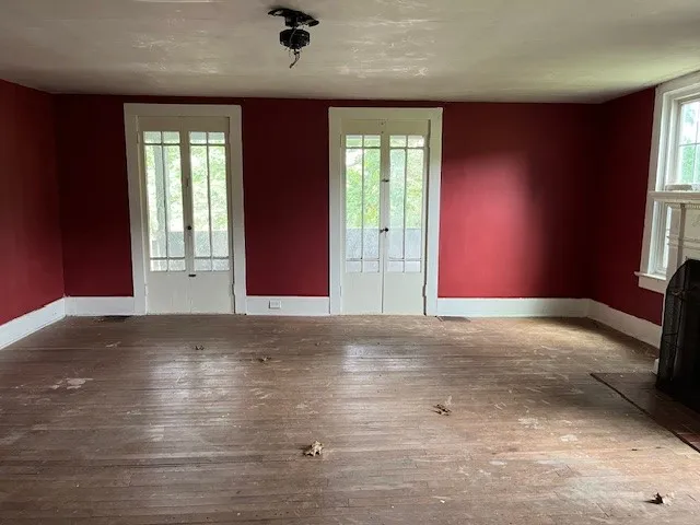 den room with french doors to porch