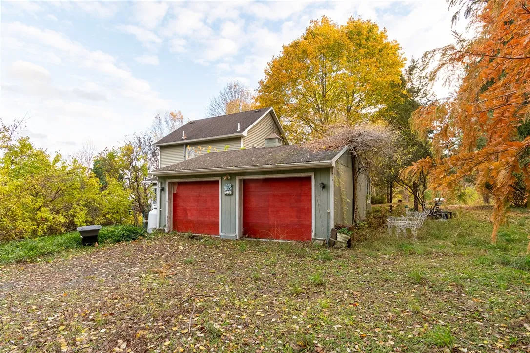 The ATTACHED TWO CAR GARAGE with a workshop!
