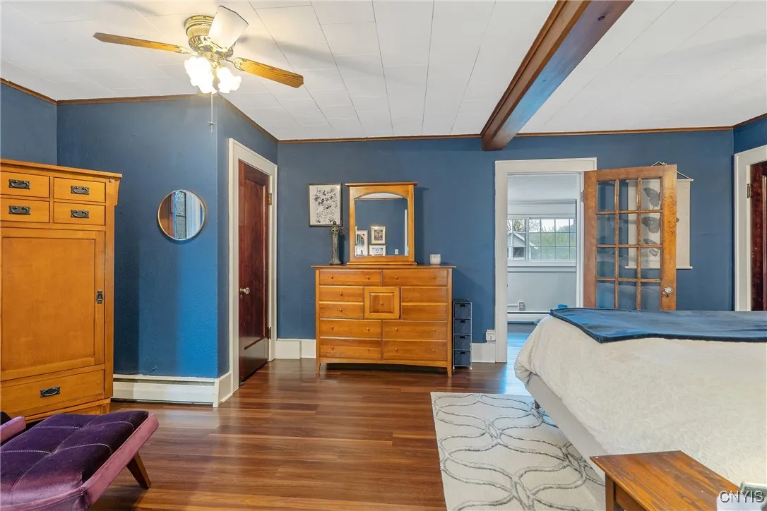Not only is this bedroom enormous, but it features THREE closets as well as a full all-season sun porch.