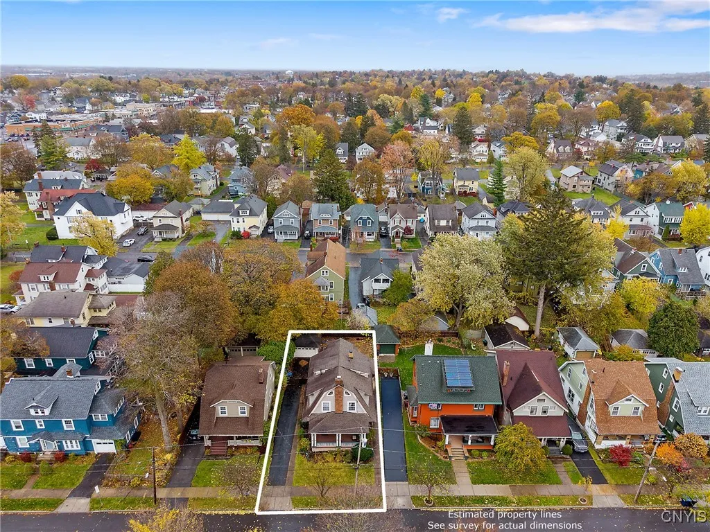 The bird's eye view offers not only a better perspective on this home's lot, but also the beauty of the Eastwood community in general. With an eclectic collection of different architectural designs and era, this is not your boring, cookie-cutter housing development!