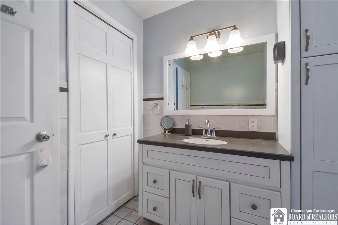 Full bath with generous storage space