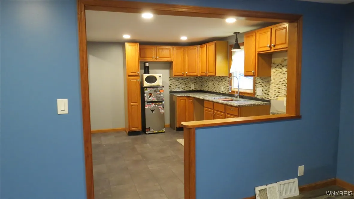 Kitchen view from the dining room / living room combo