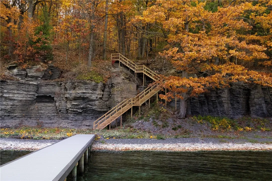 New stairs and dock shown as an example — similar lake access can be added to your property.