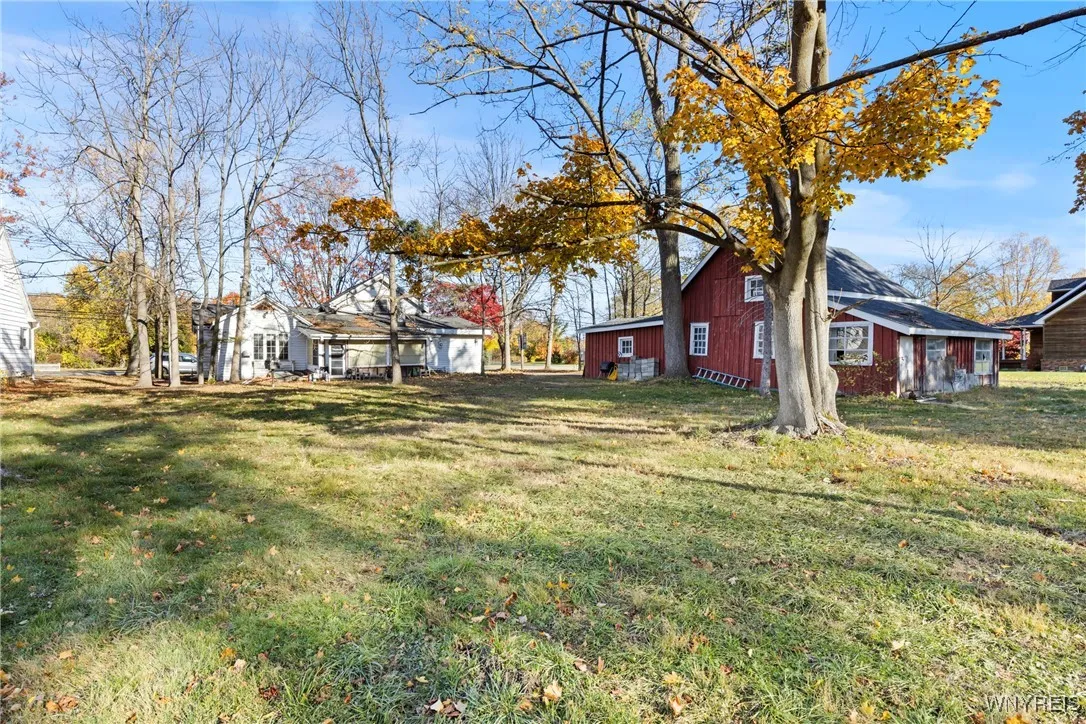 large garage/barn out building with floored second floor