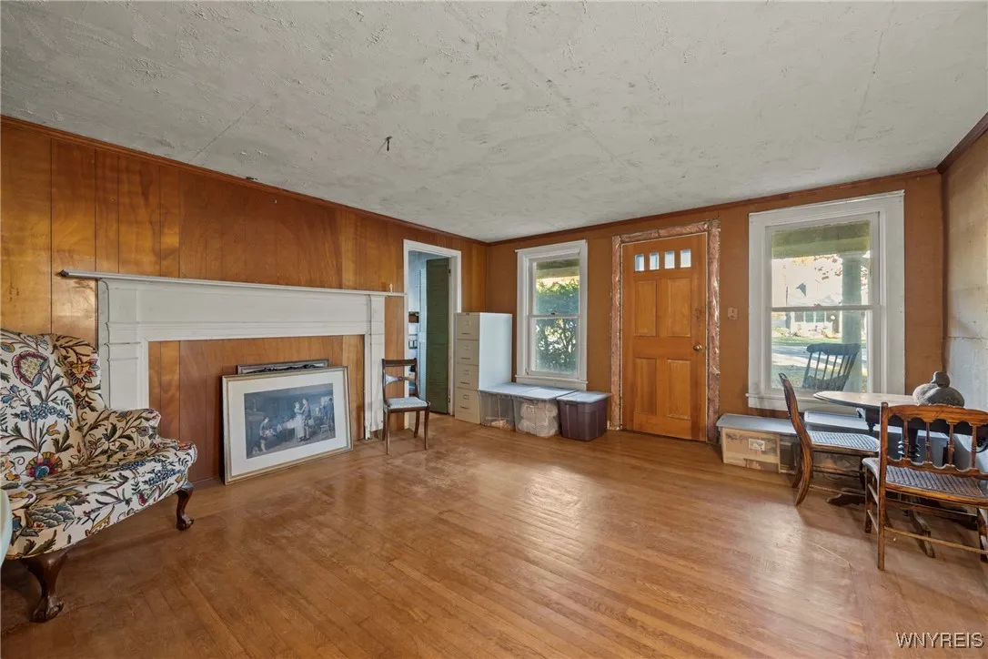large family room with beautiful hardwood floors