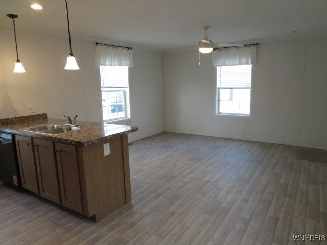 Open floor plan & all windows are double hung  which makes for easy cleaning inside!  Neutral flooring throughout...