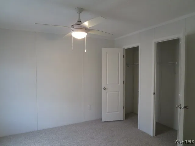 Bedroom with wall to wall closet space ...