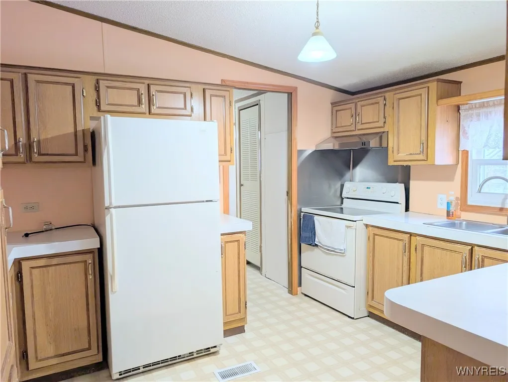 Fridge in kitchen also included