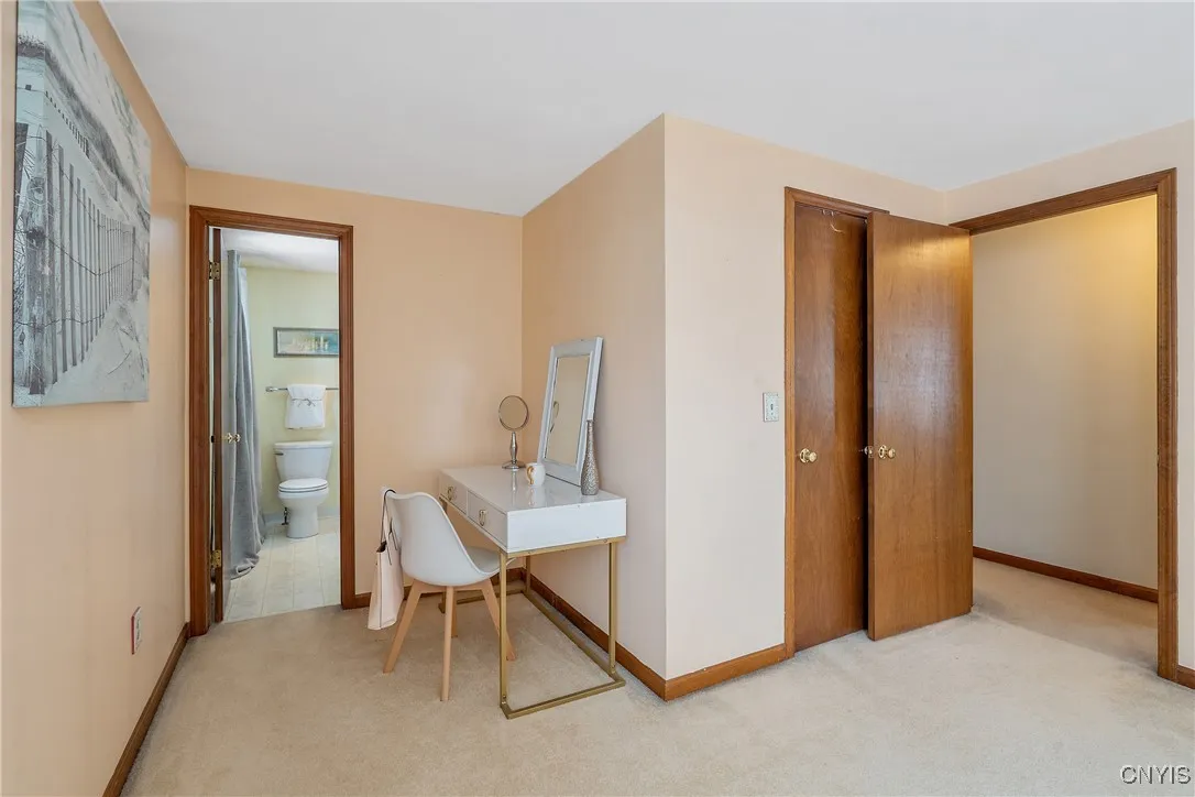 Primary bedroom entry to full bath