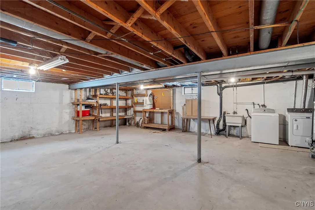 Full, dry basement with steel I beam construction