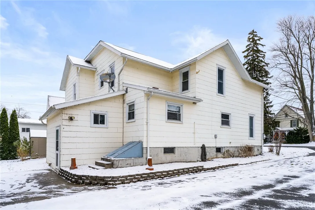 BACK LEFT SIDE OF HOME