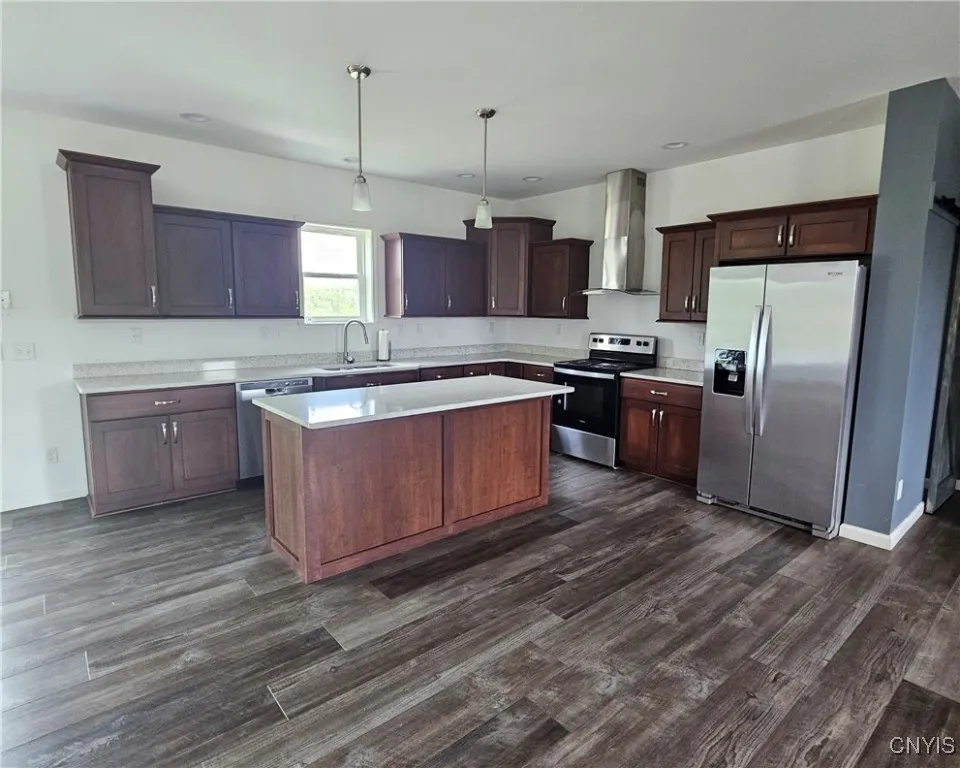 Kitchen with lots of cabinets and island