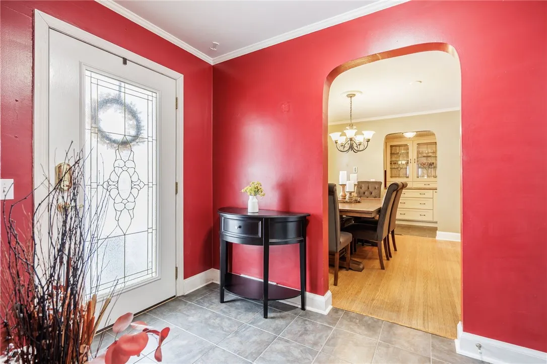 Entryway features ceramic tile.