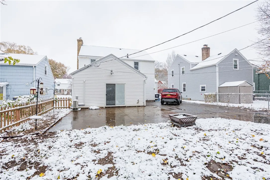Large patio in the rear of property ideal for entertaining or relaxing.