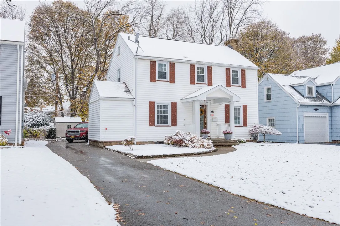 Driveway leads to 1 car attached garage.